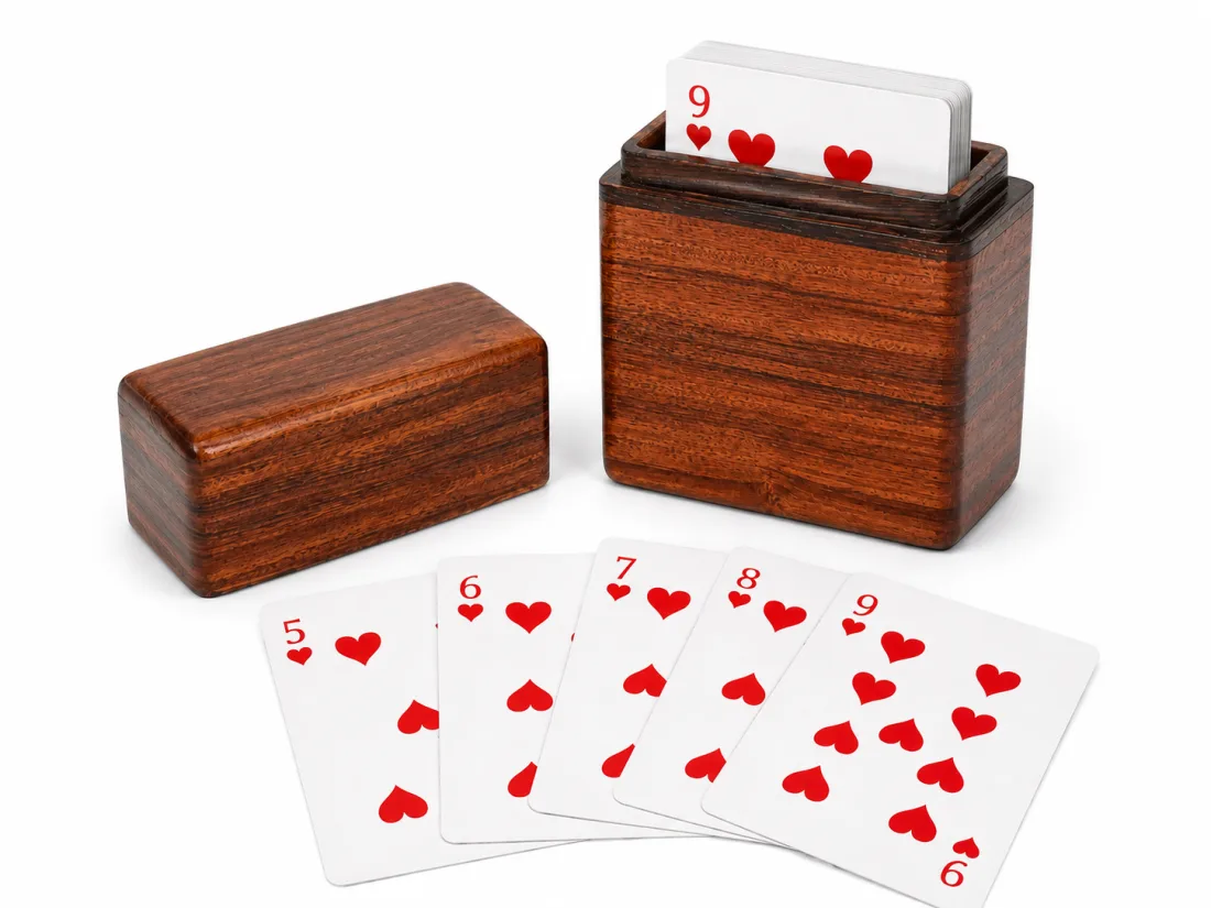 Reddish wooden card box with a lift-off lid, sized for a deck of cards