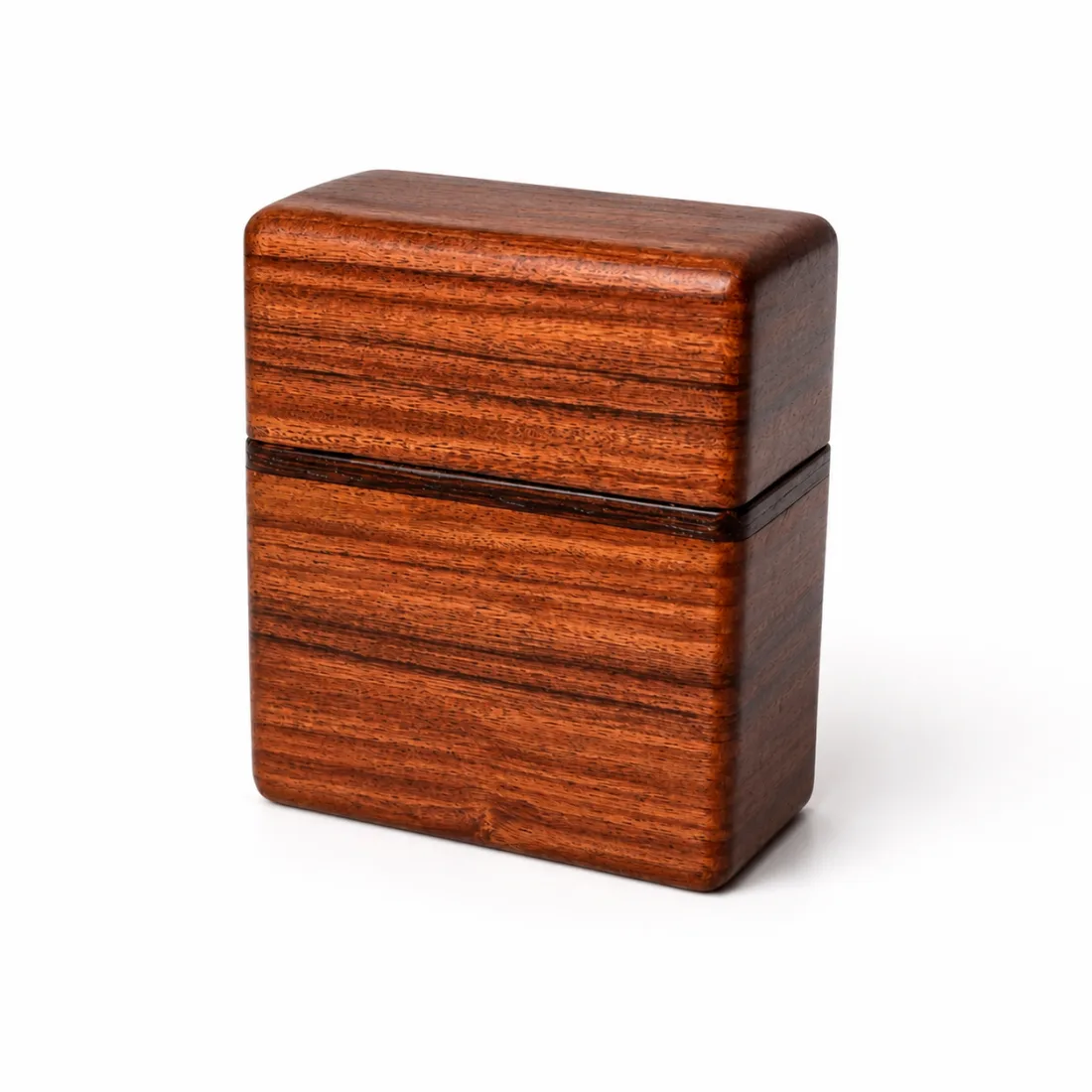 The reddish card box closed, grain running across the lid seam