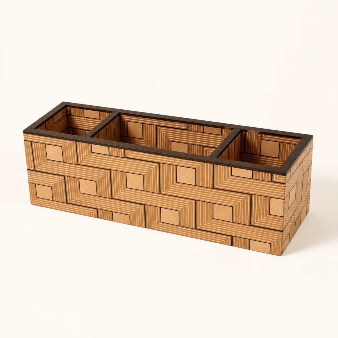 Long three-compartment desk organizer clad in tumbling-block parquetry
