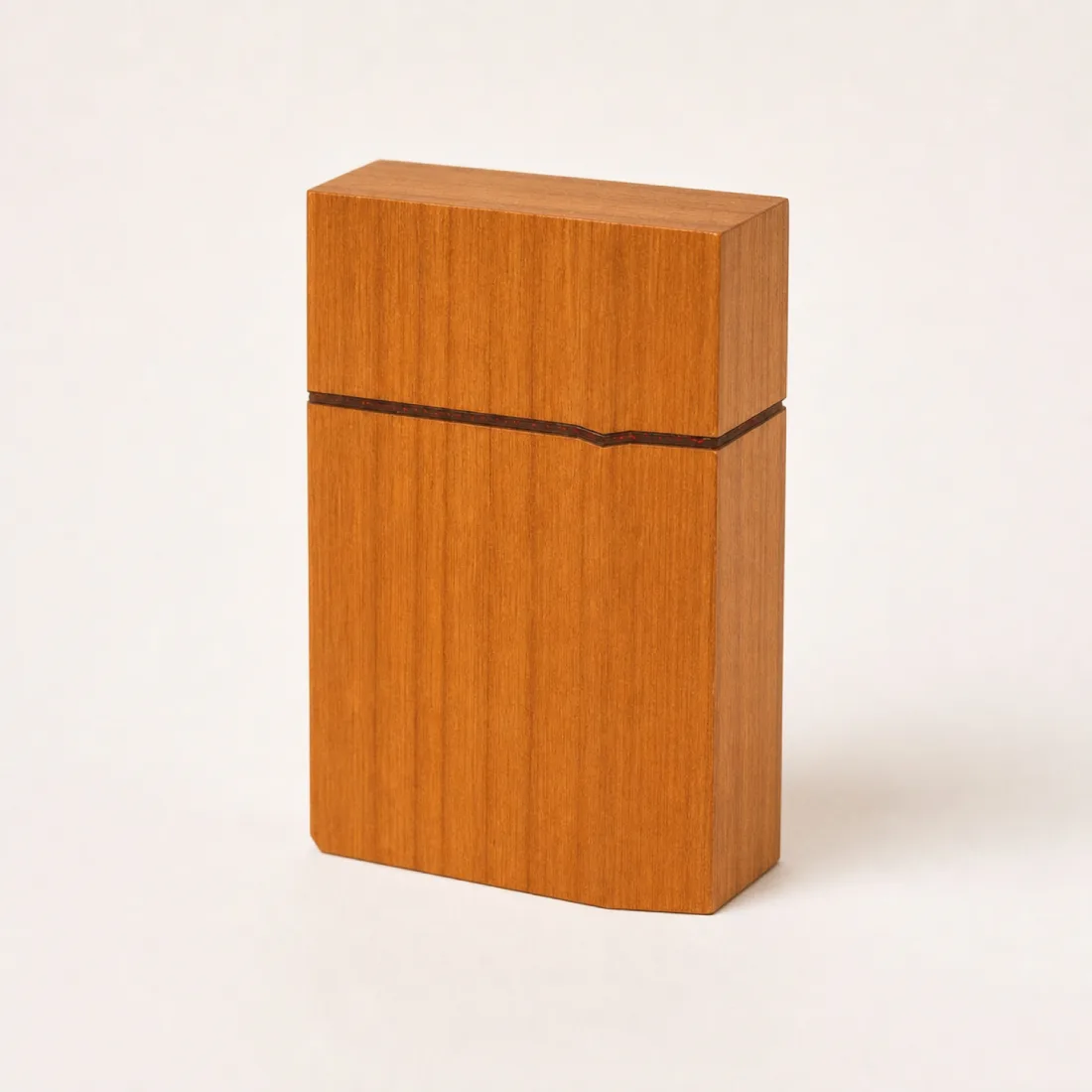 Golden box with a faceted lid split by a thin red seam of inlay