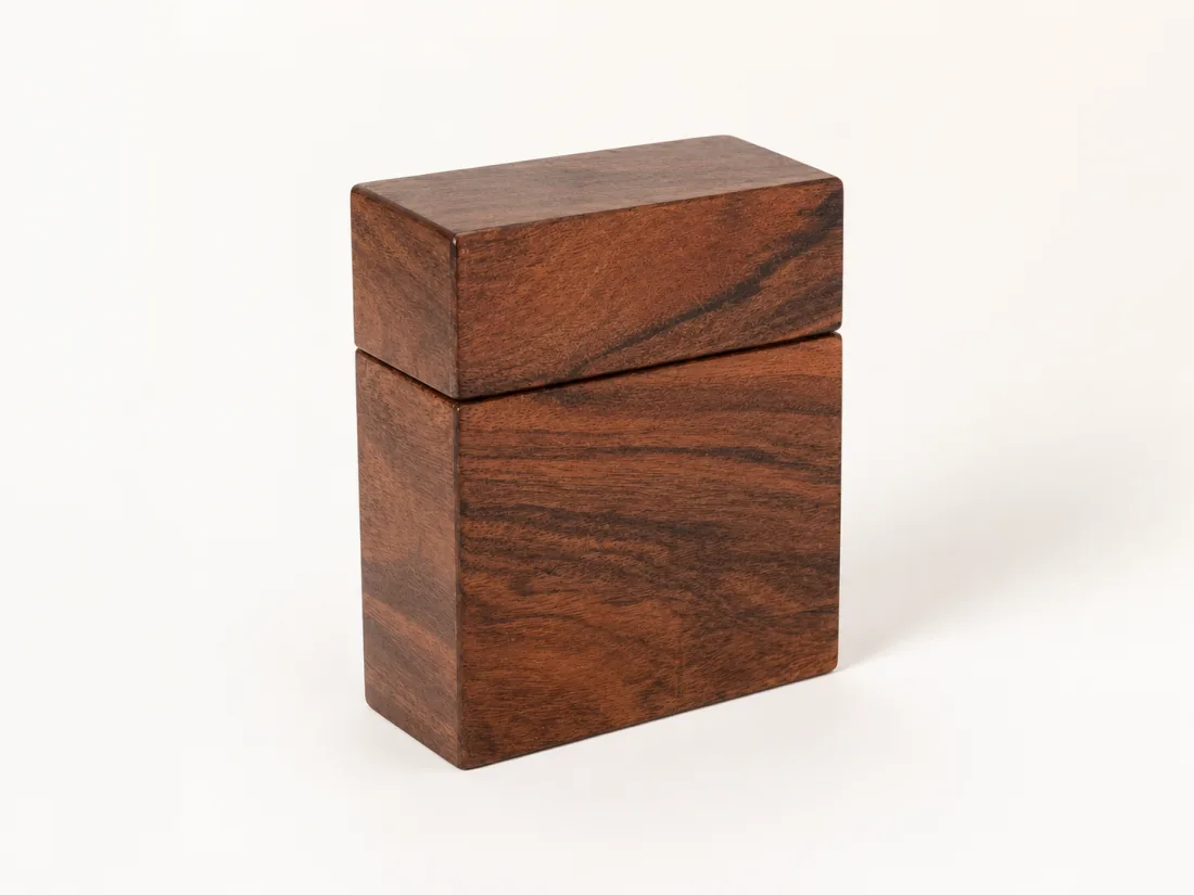 Angled view of the compact reddish card box