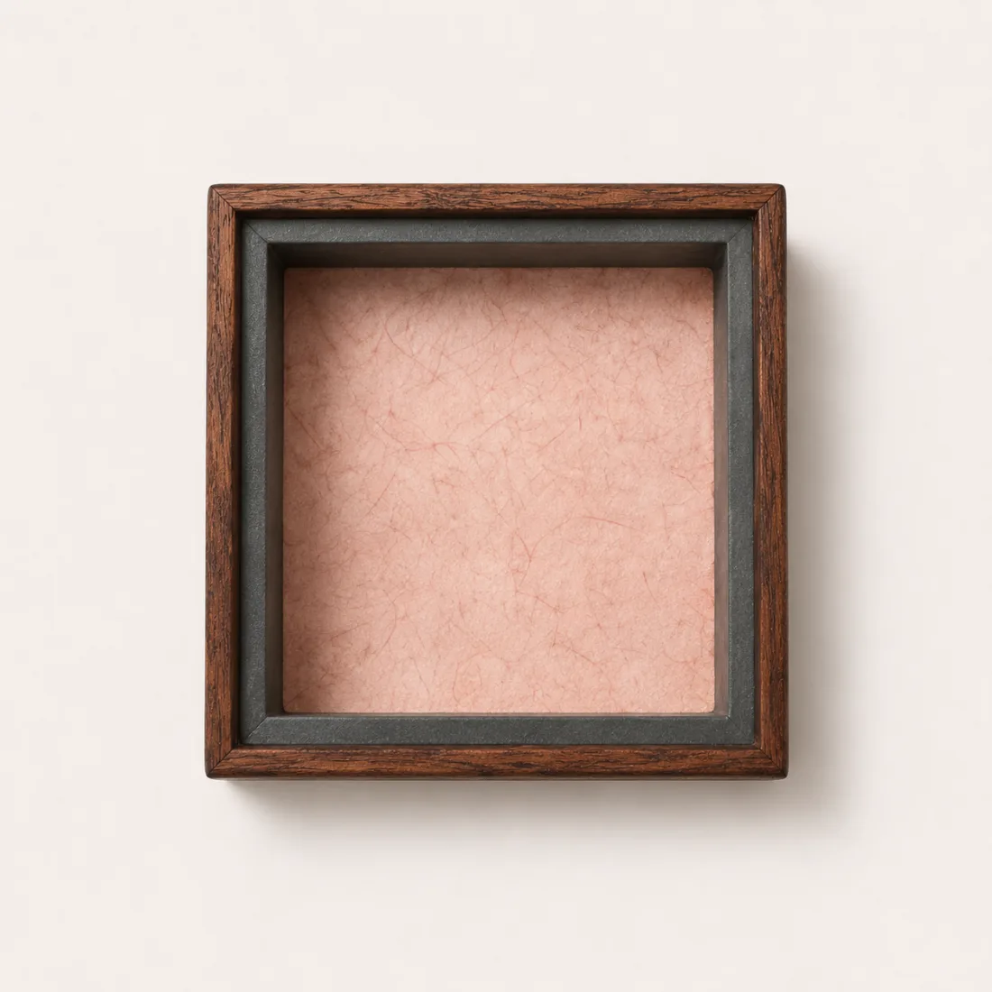 Angled view of the kumiko-lid box showing the walnut frame and lattice