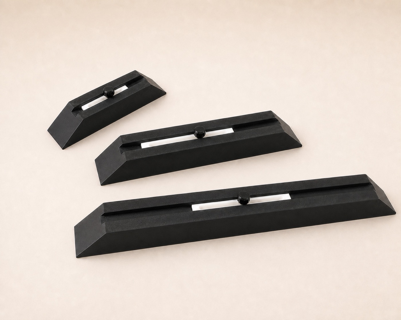 Three paring jigs in small, medium and long sizes