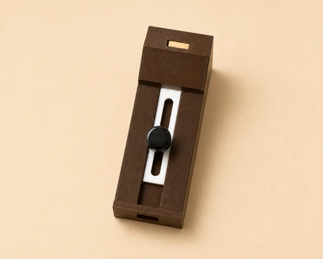 Brown paring jig with a retaining bridge, white slotted stop and black locking knob
