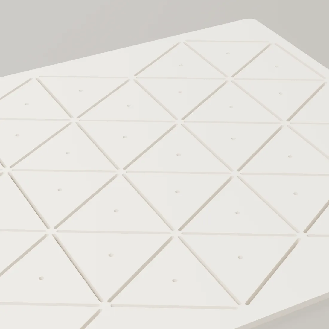3D-printed kumiko triangle stencil — a plate slotted with an isometric triangle grid and centre registration holes